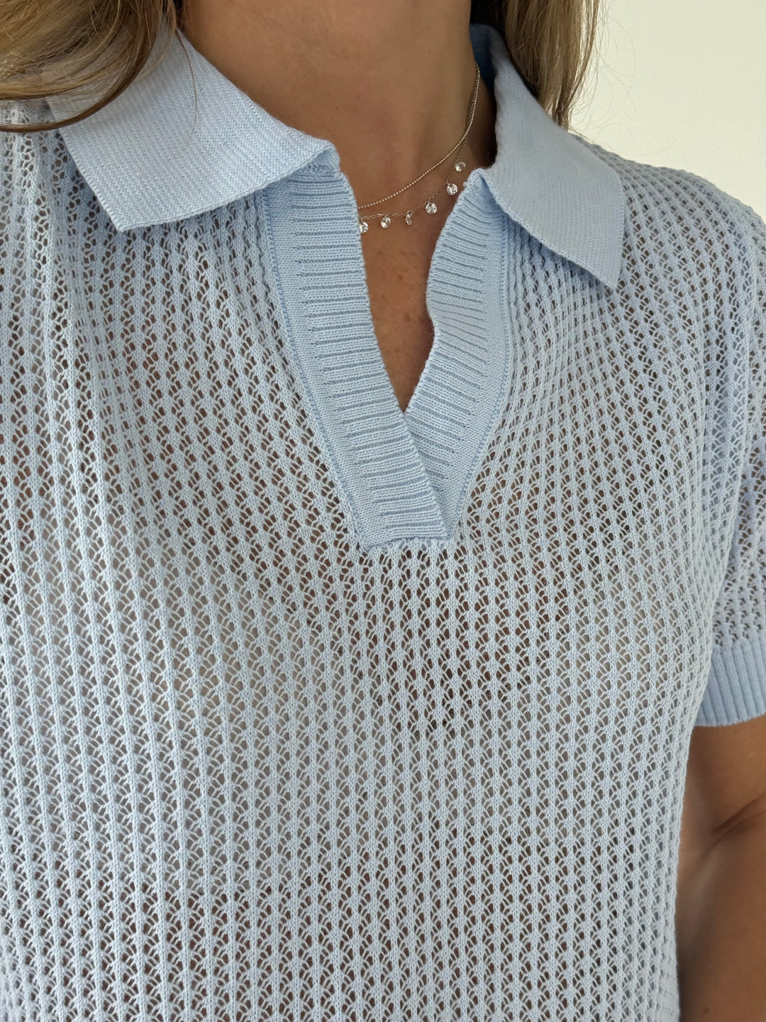 Adīts caurspīdīgs polo tops