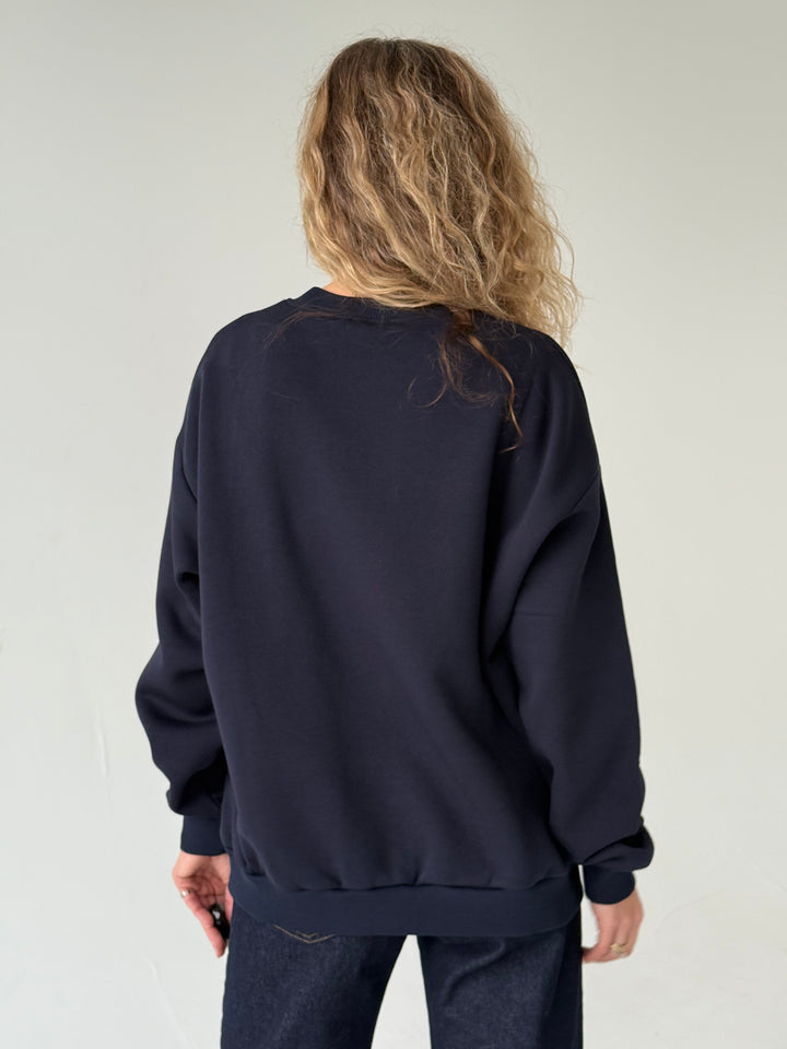 Kokvilnas oversize džemperis ar uzrakstu un siltinājumu