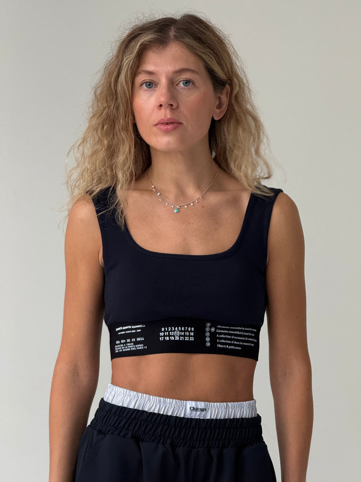 Īss kokvilnas rievots tops