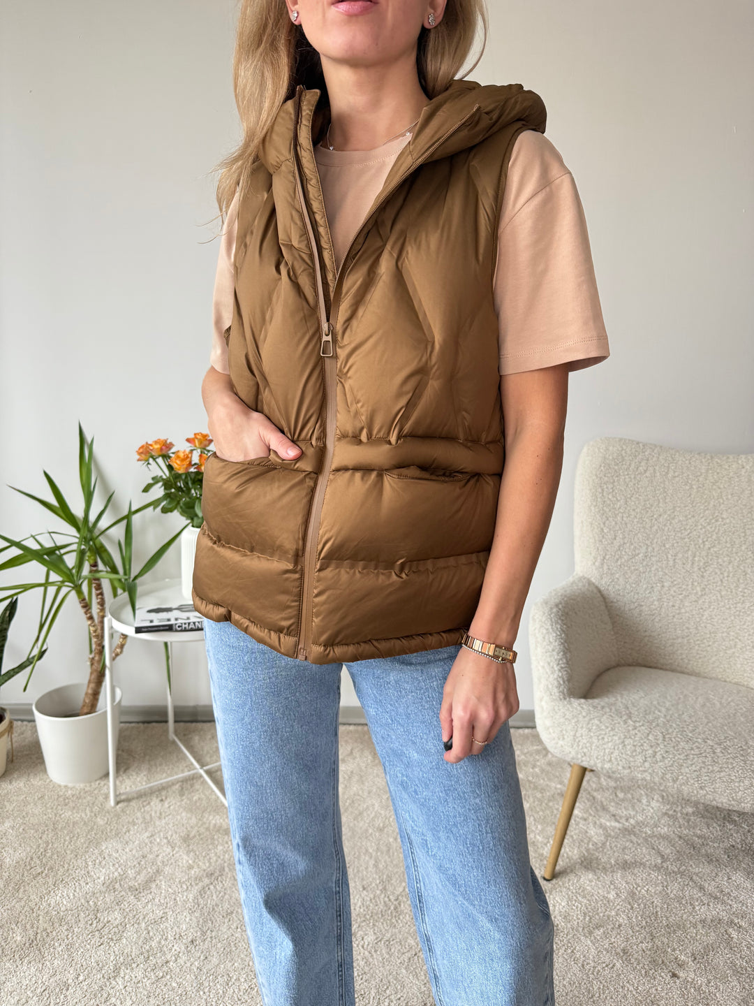 Stepēta veste ar kapuci