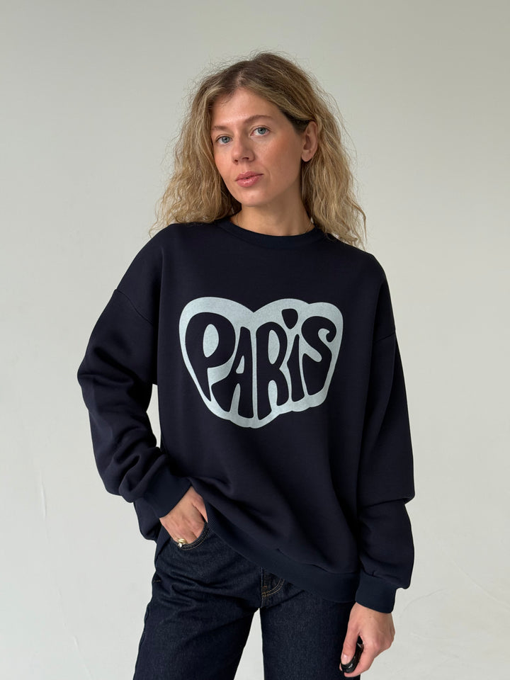 Kokvilnas oversize džemperis ar uzrakstu un siltinājumu