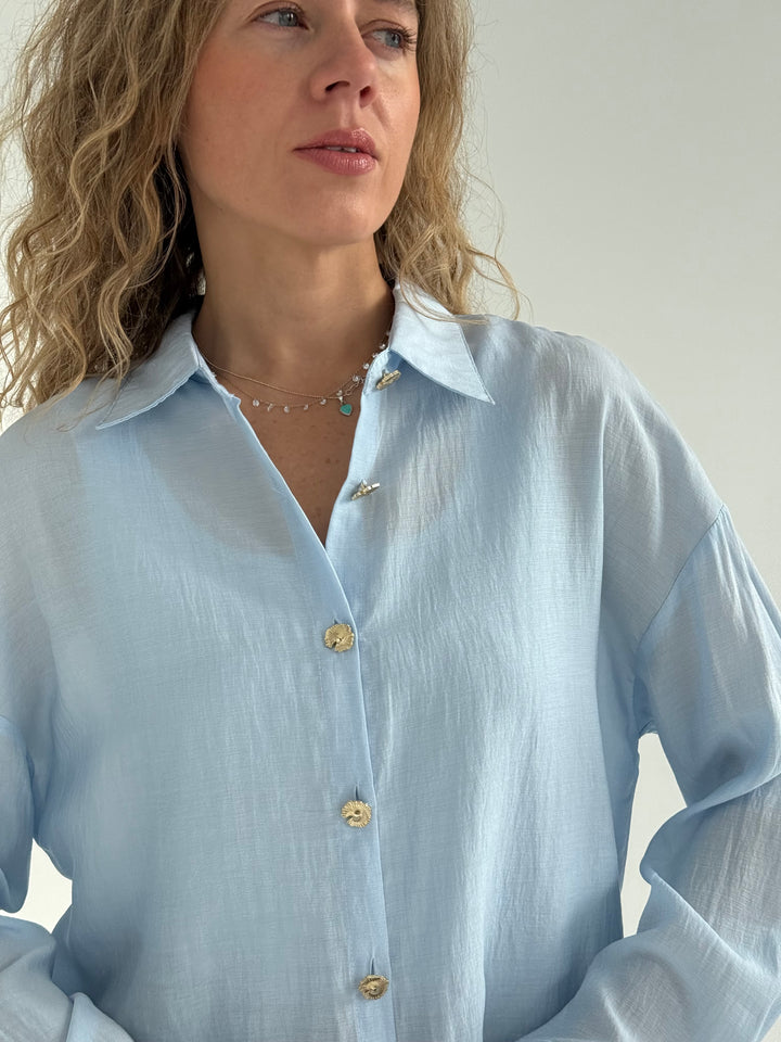 Viskozes blūze ar zelta pogām