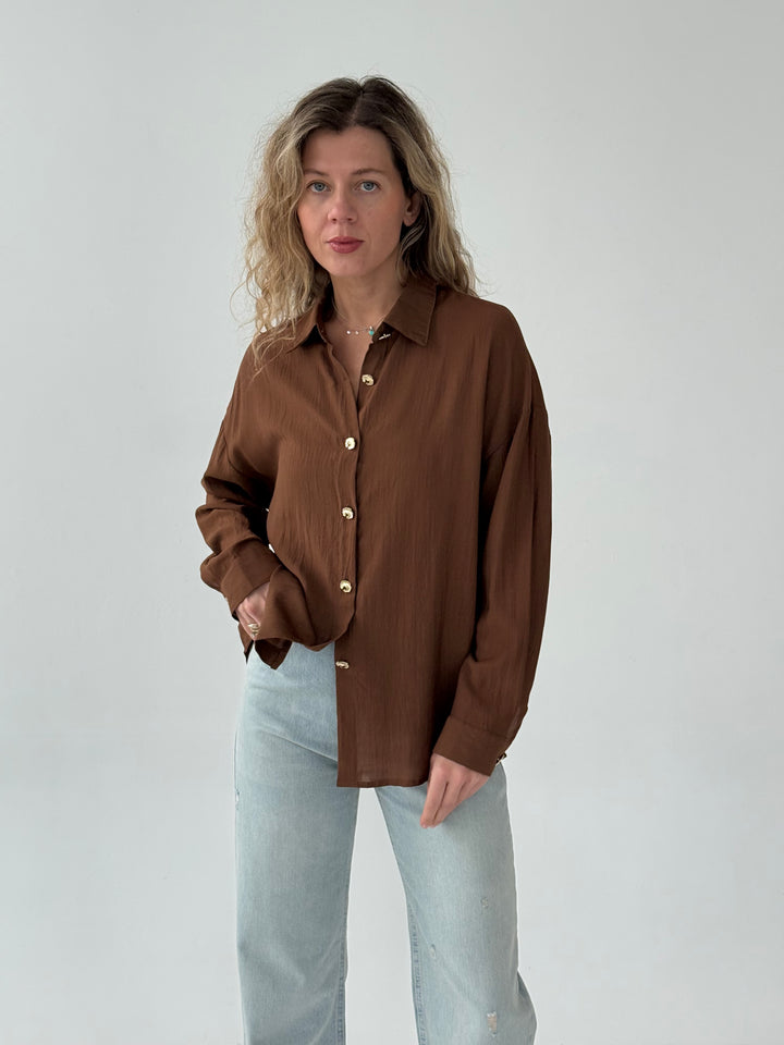 Viskozes blūze ar zelta pogām