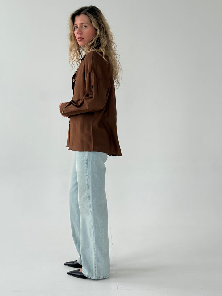 Viskozes blūze ar zelta pogām