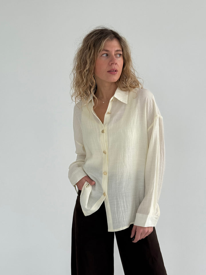 Viskozes blūze ar zelta pogām