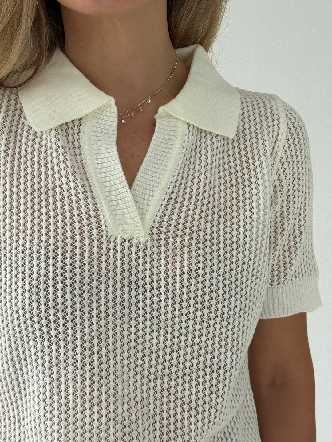 Adīts caurspīdīgs polo tops