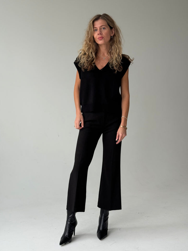 Saīsinātas zvanveida bikses