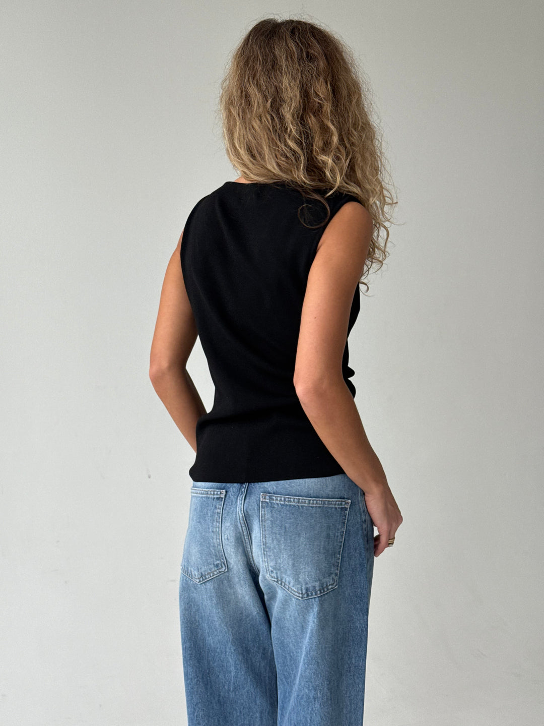 Adīts viskozes tops ar krokotu elementu