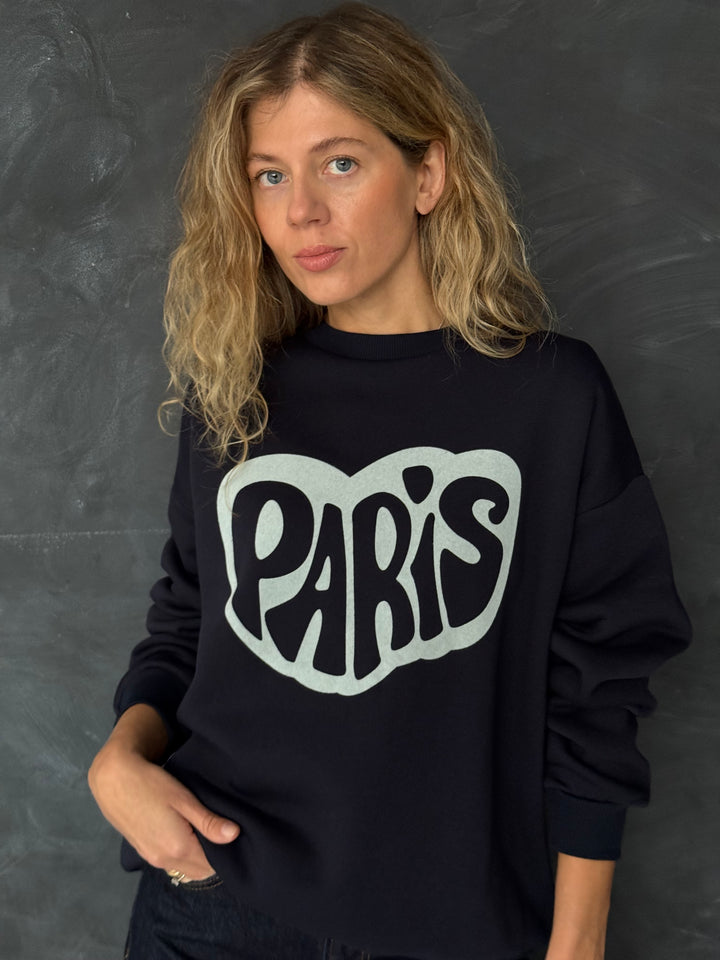 Kokvilnas oversize džemperis ar uzrakstu un siltinājumu