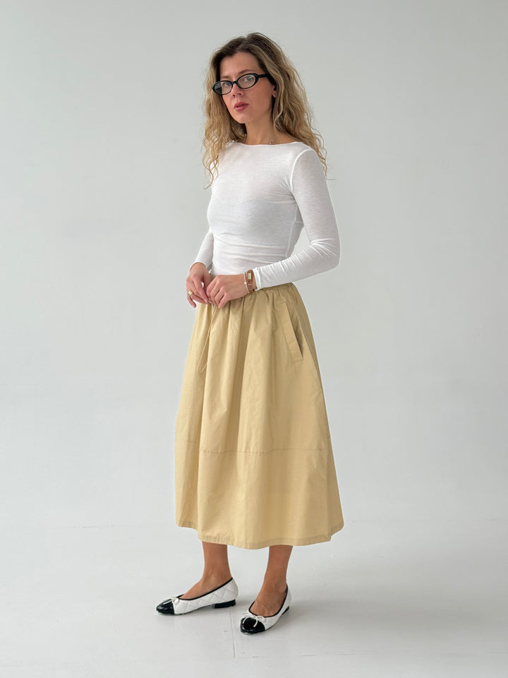 Kokvilnas svārki ar kabatām un savelkamu aukliņu