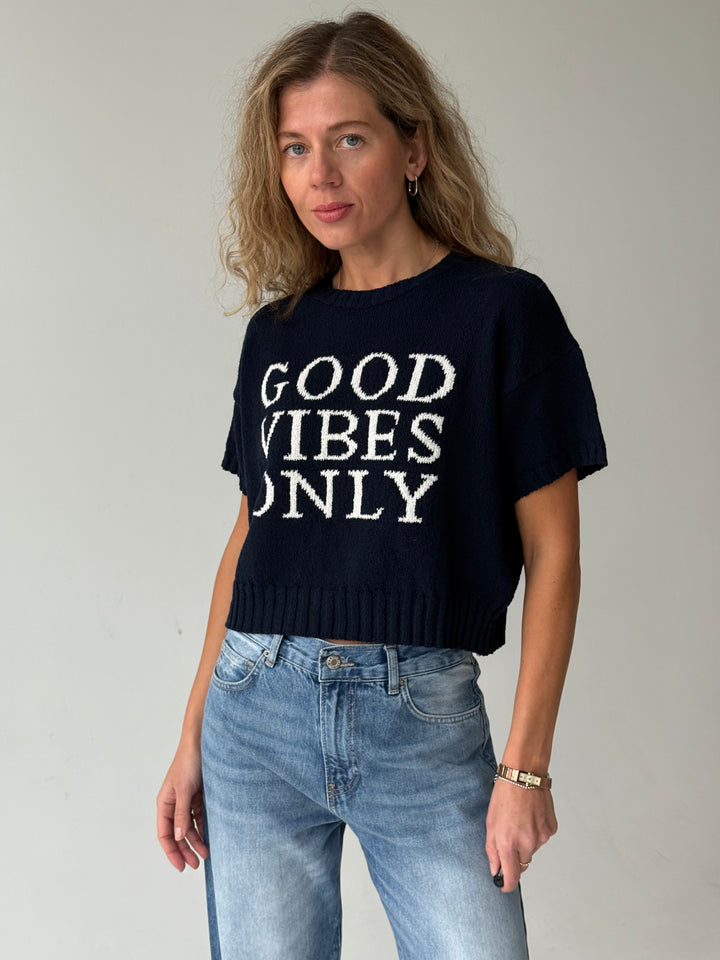 Adīts kokvilnas džemperis ar uzrakstu