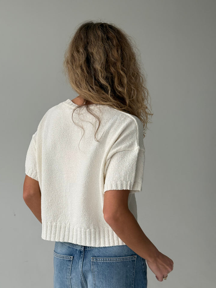 Adīts kokvilnas džemperis ar uzrakstu