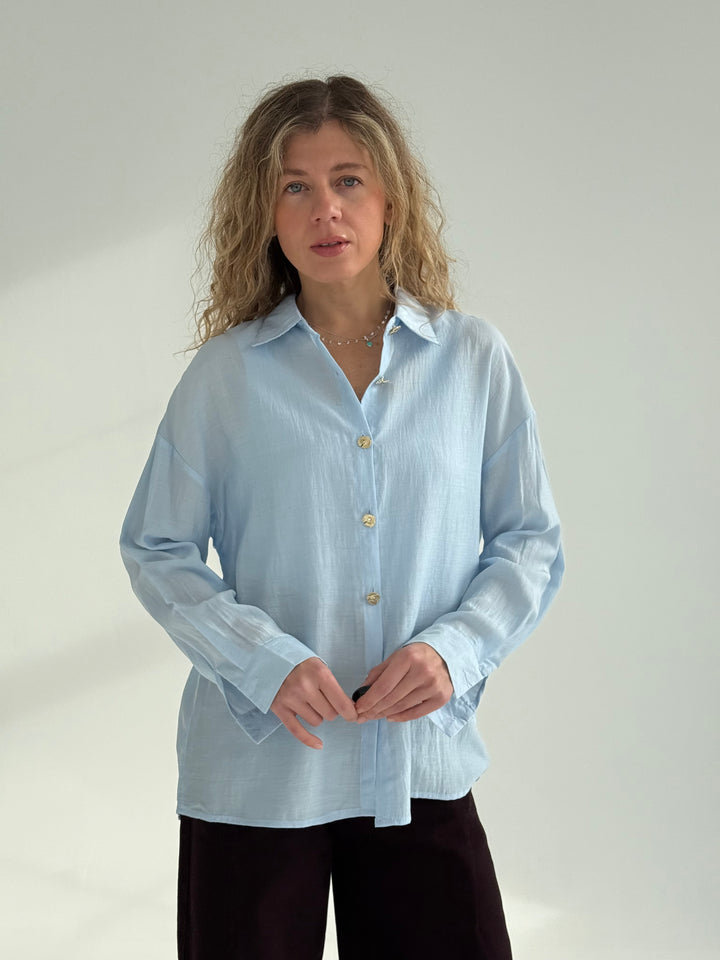 Viskozes blūze ar zelta pogām