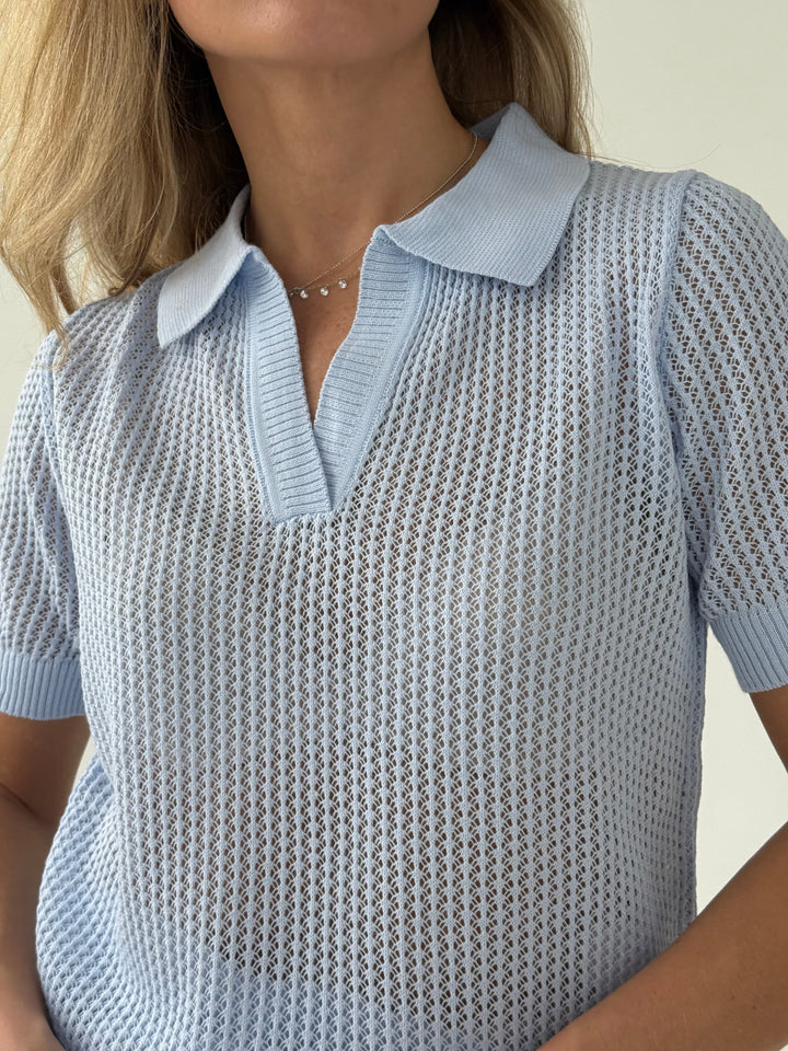 Adīts caurspīdīgs polo tops