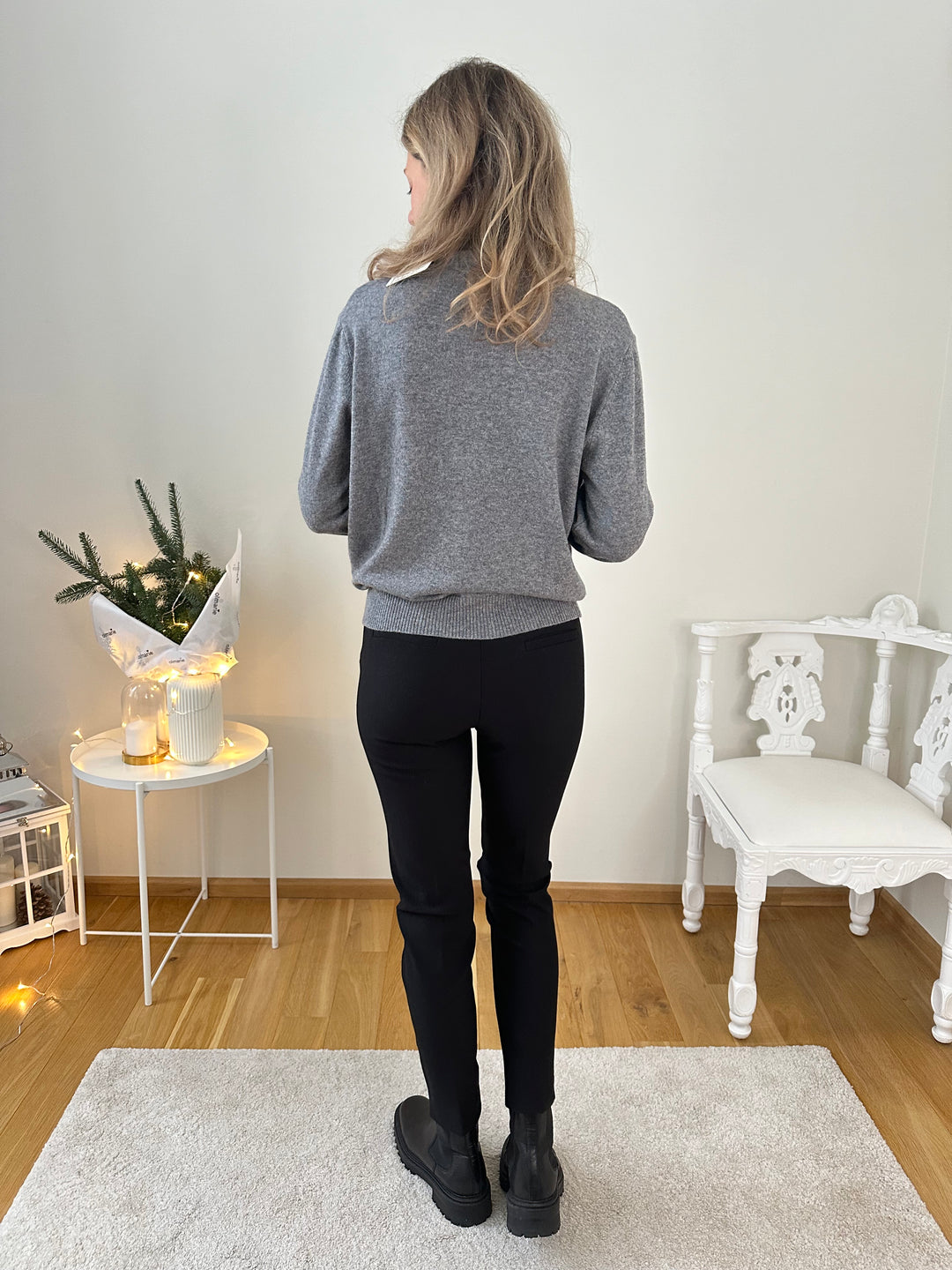 Slim knitted wool sweater with a high collar