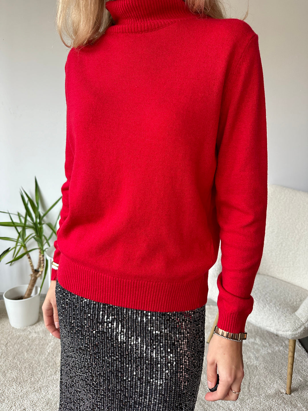 Slim knitted wool sweater with a high collar