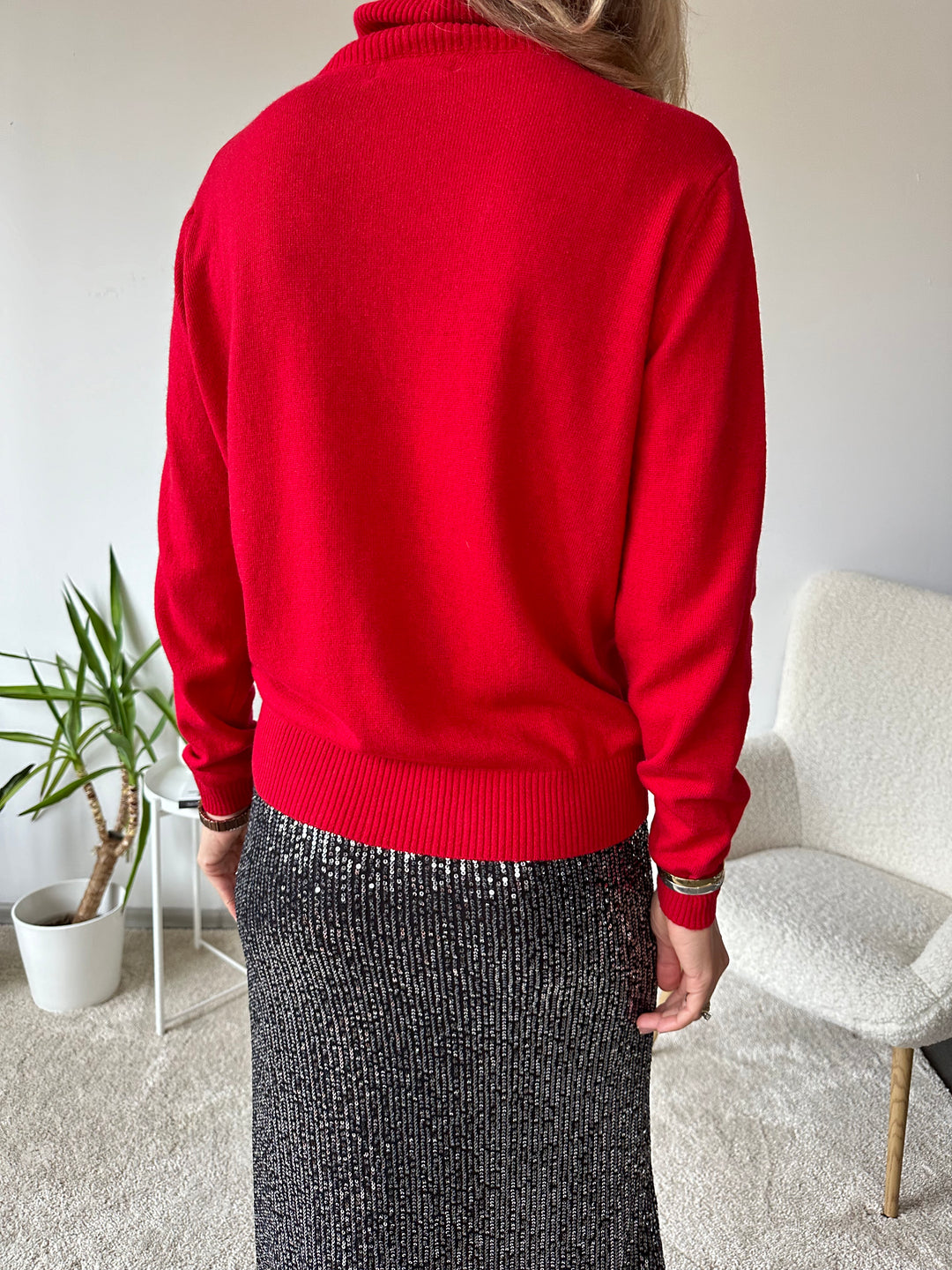 Slim knitted wool sweater with a high collar