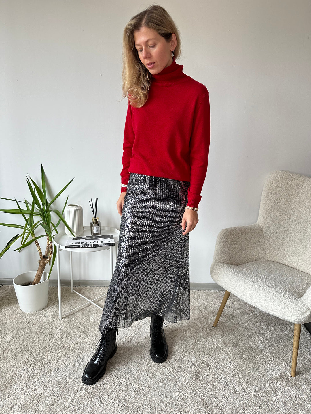 Slim knitted wool sweater with a high collar