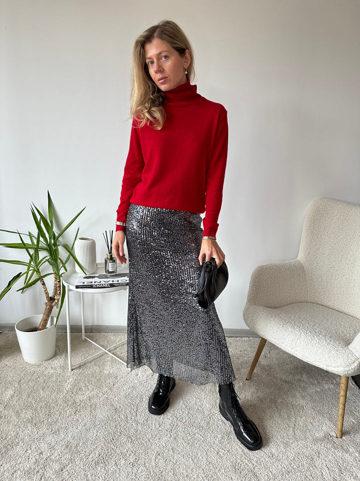 Slim knitted wool sweater with a high collar