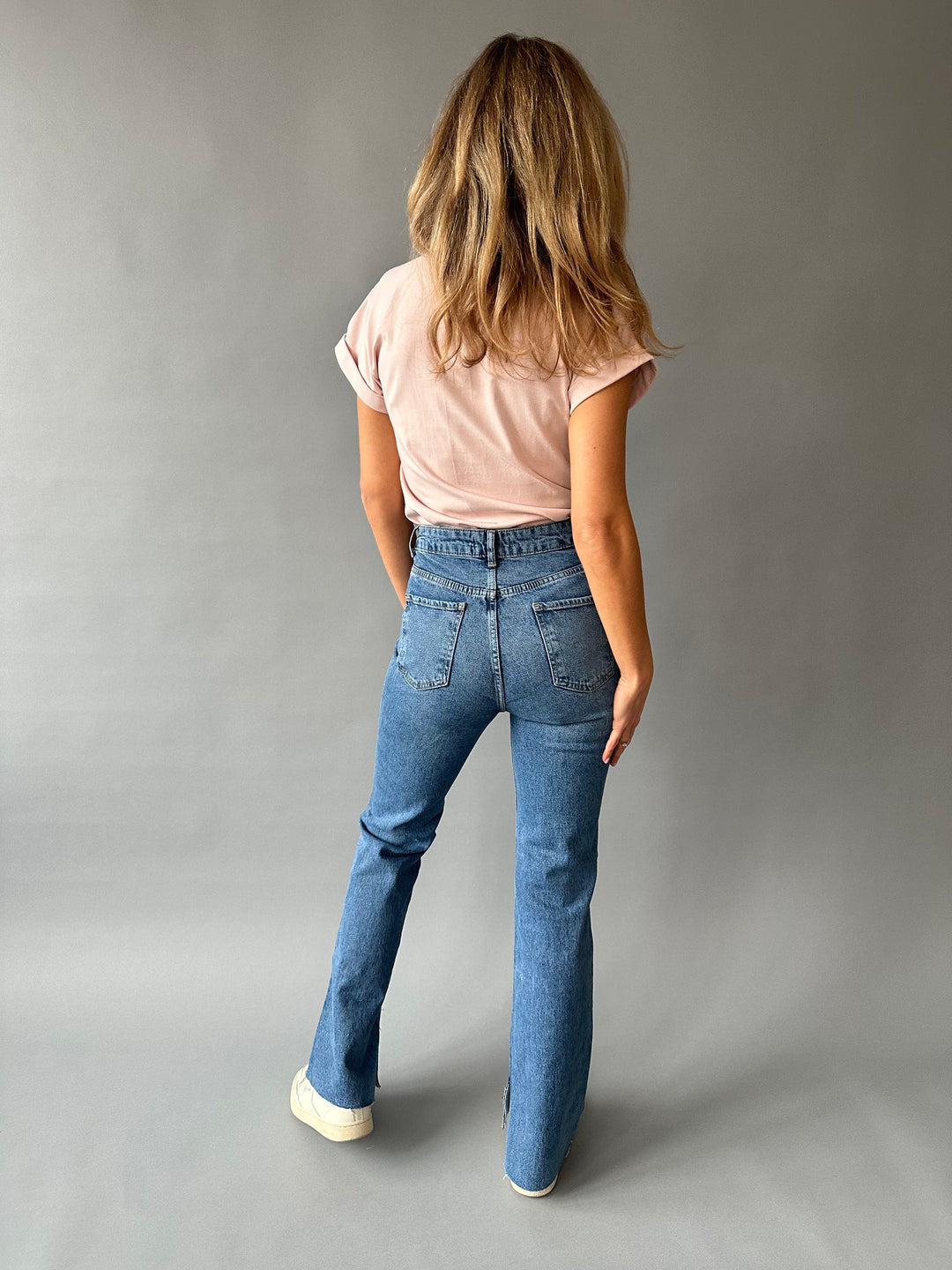 Flare jeans with side slits