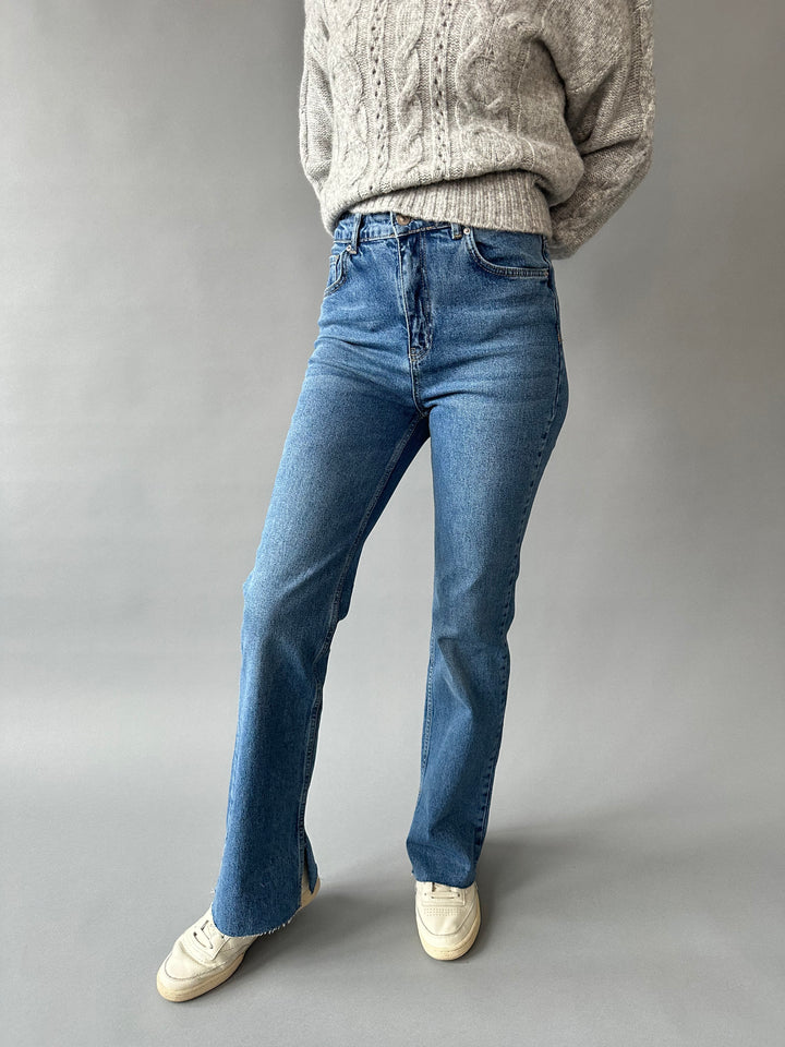 Flare jeans with side slits