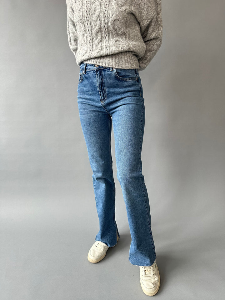 Flare jeans with side slits