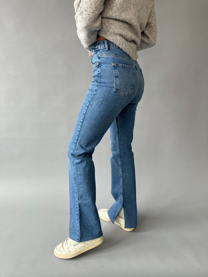 Flare jeans with side slits